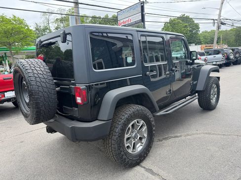 Used 2013 Jeep Wrangler Unlimited Rubicon w/ Dual Top Group AWD/4WD image 4