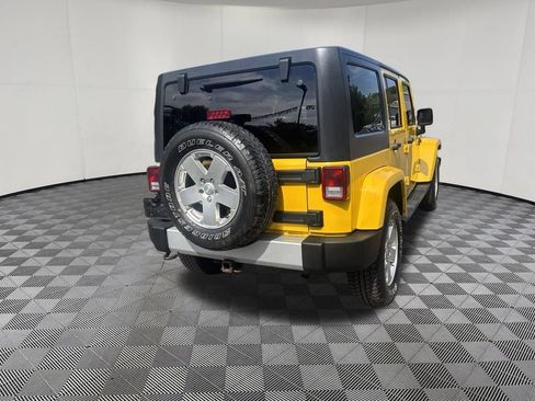 Used 2011 Jeep Wrangler Unlimited Sahara w/ Dual Top Group AWD/4WD image 12