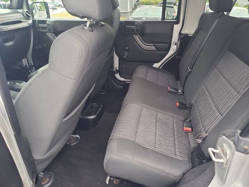 Used 2012 Jeep Wrangler Unlimited Sport w/ Dual Top Group AWD/4WD image 12