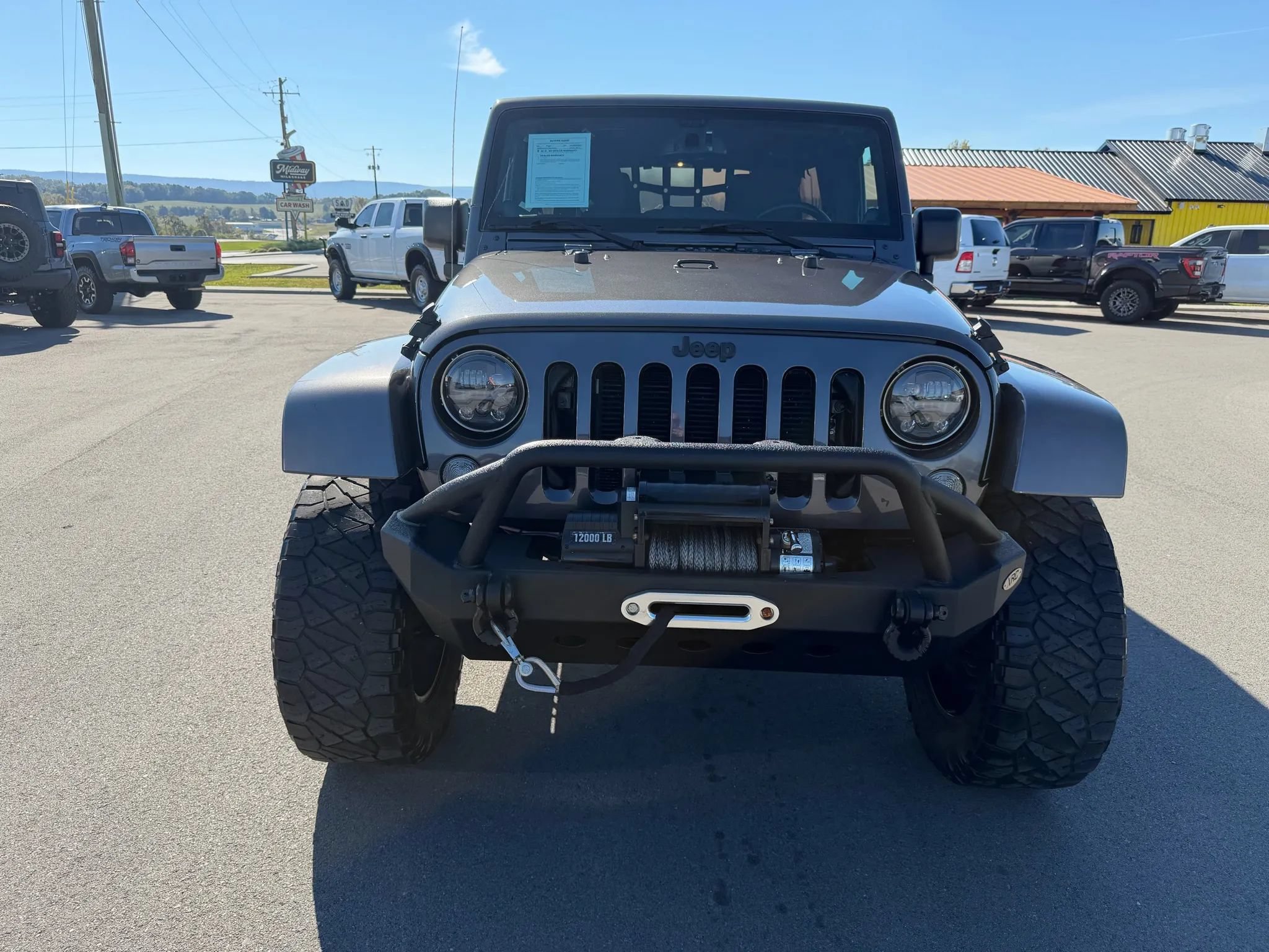Used 2014 Jeep Wrangler Unlimited Sahara w/ Dual Top Group AWD/4WD image 18