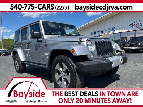 Used 2015 Jeep Wrangler Unlimited Sahara w/ Max Tow Package AWD/4WD image 1