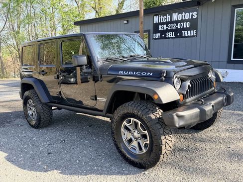 Used 2013 Jeep Wrangler Unlimited Rubicon w/ Dual Top Group image 1