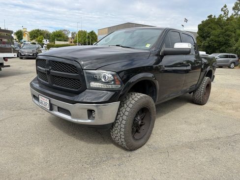 Used 2018 RAM 1500 Laramie AWD/4WD image 1
