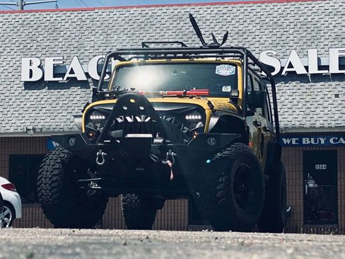 Used 2011 Jeep Wrangler Unlimited Sport image 1