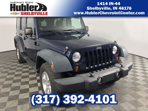 Used 2013 Jeep Wrangler Unlimited Sport image 1