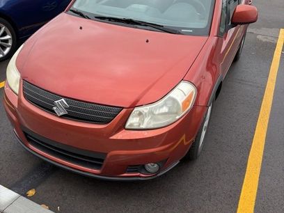 Used 2009 Suzuki SX4 AWD Hatchback w/ Touring Pkg