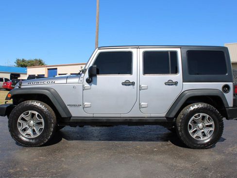 Used 2013 Jeep Wrangler Unlimited Rubicon w/ Dual Top Group image 13