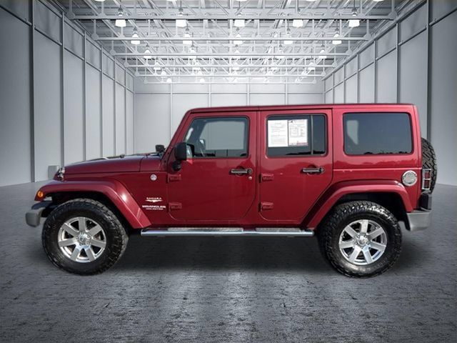 Used 2012 Jeep Wrangler Unlimited Sahara w/ Mopar Chrome Edition Group AWD/4WD image 2