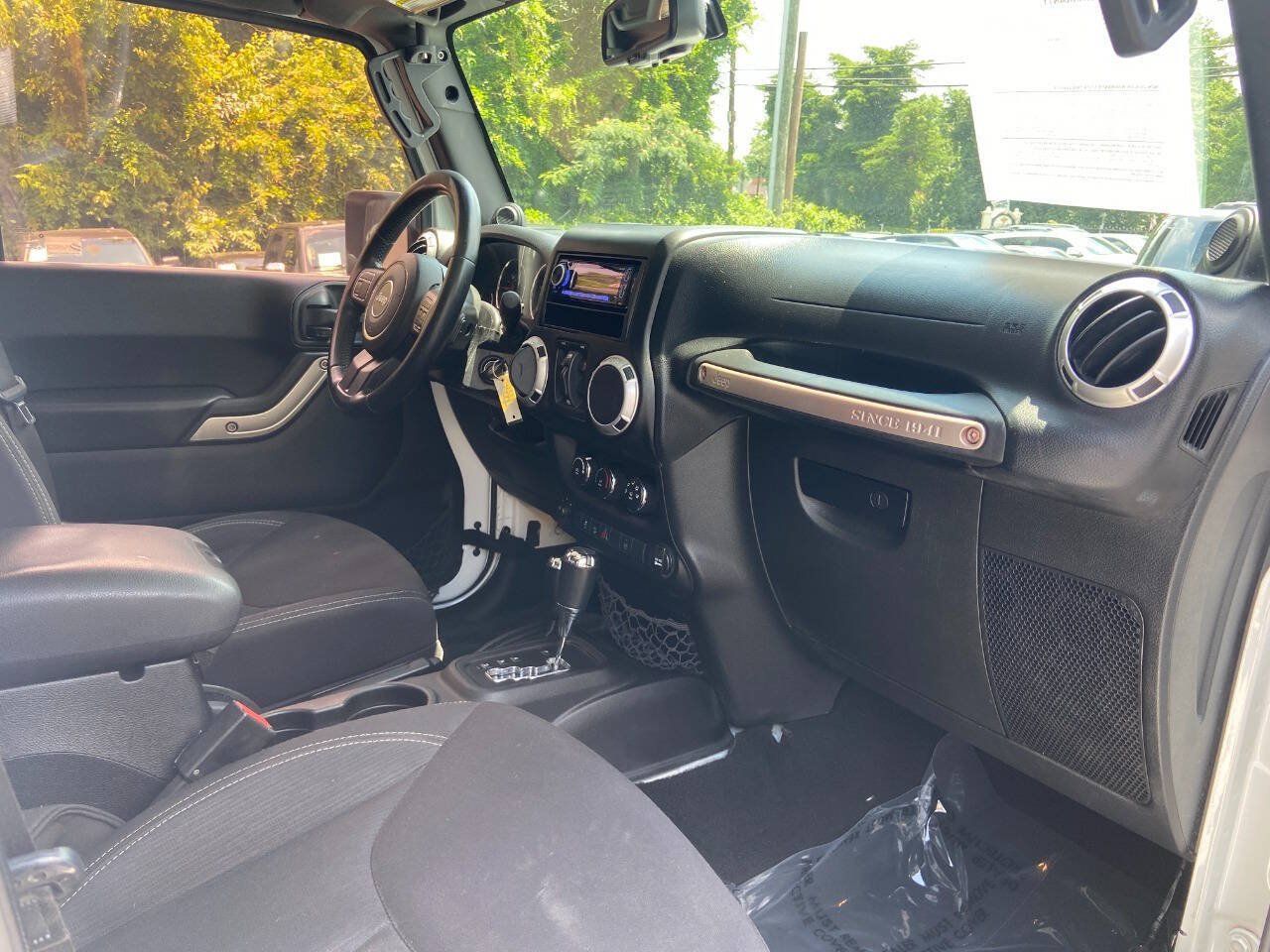Used 2013 Jeep Wrangler Unlimited Sahara AWD/4WD image 12