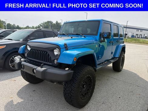 Used 2014 Jeep Wrangler Unlimited Sahara AWD/4WD image 1
