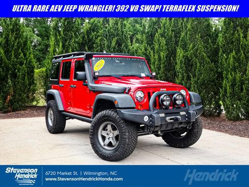 Used 2012 Jeep Wrangler Unlimited Sport AWD/4WD image 1