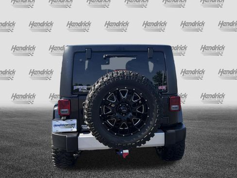 Used 2014 Jeep Wrangler Unlimited Sahara w/ Trailer Tow Group AWD/4WD image 9