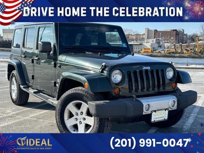 Used 2011 Jeep Wrangler Unlimited Sahara w/ Dual Top Group