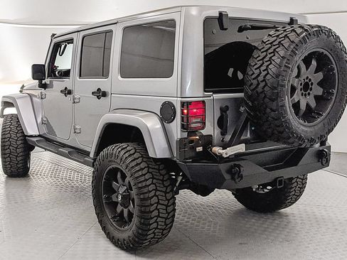 Used 2014 Jeep Wrangler Unlimited Rubicon w/ Dual Top Group AWD/4WD image 4