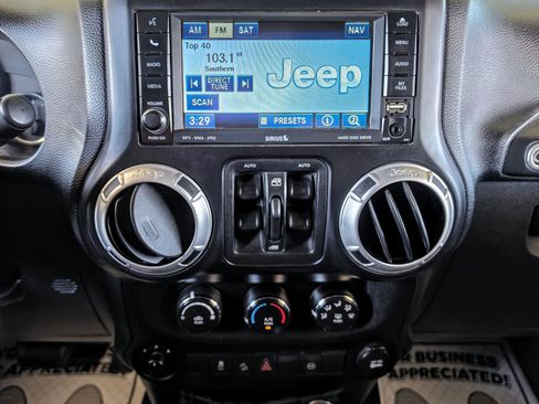 Used 2012 Jeep Wrangler Unlimited Sahara w/ Connectivity Group AWD/4WD image 11