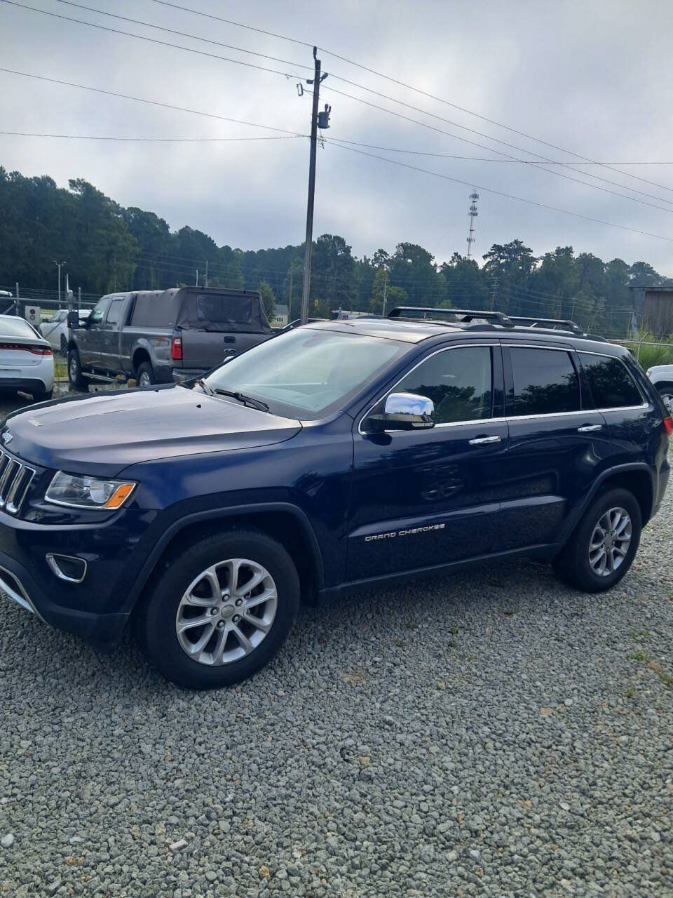 Used 2016 Jeep Grand Cherokee Limited AWD/4WD image 1