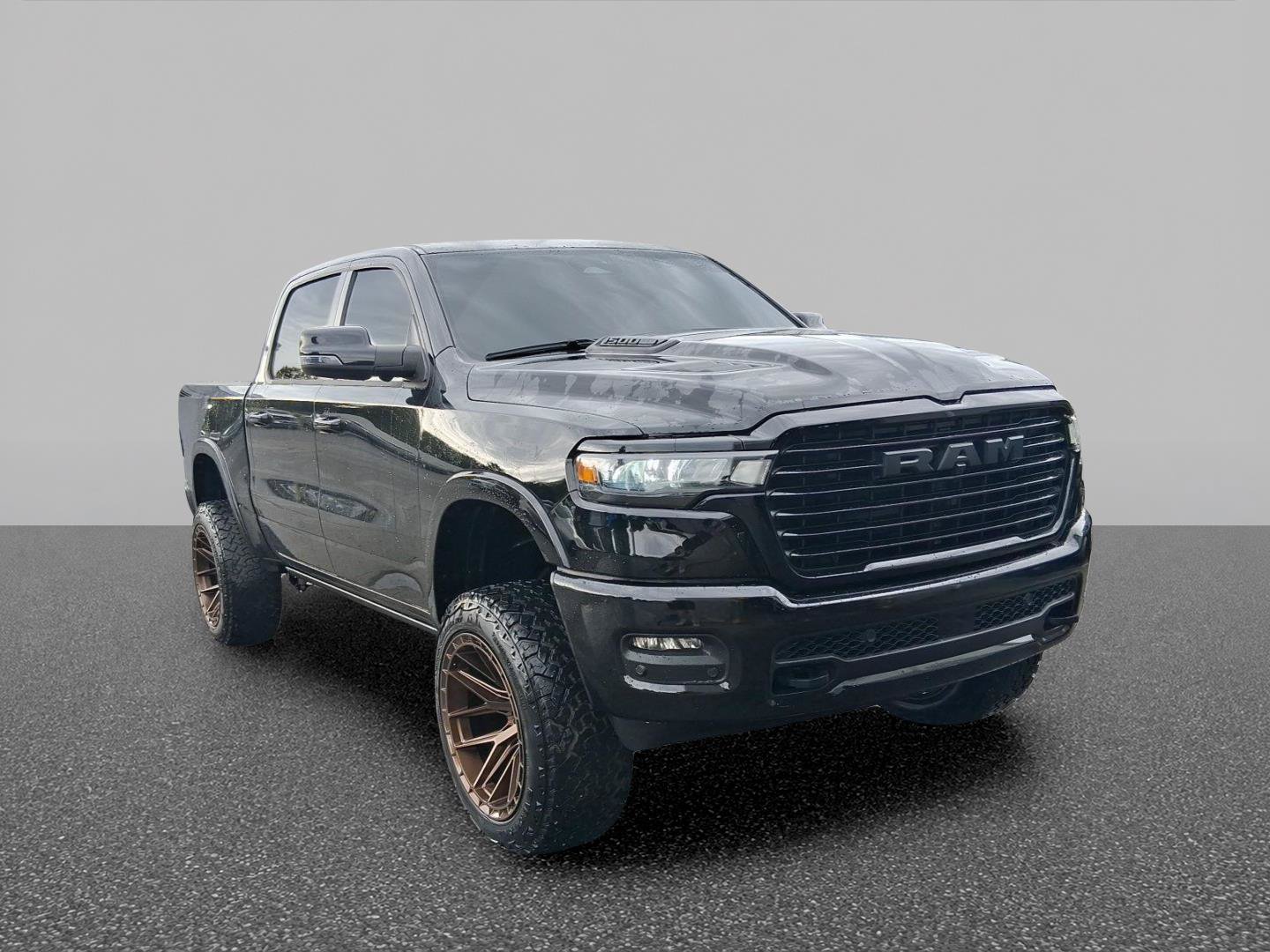 Used 2025 RAM 1500 Laramie w/ Night Edition AWD/4WD image 1