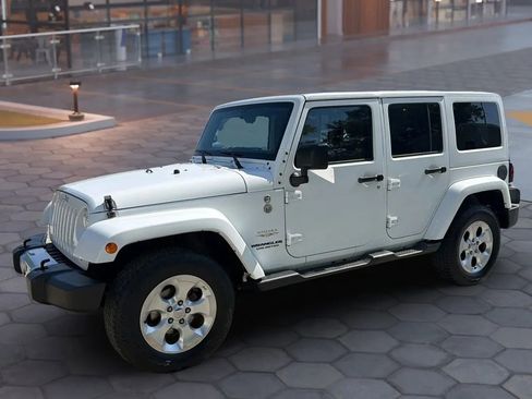 Used 2015 Jeep Wrangler Unlimited Sahara w/ Mopar Chrome Edition Group AWD/4WD image 3