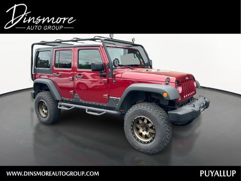 Used 2013 Jeep Wrangler Unlimited Sport AWD/4WD image 1