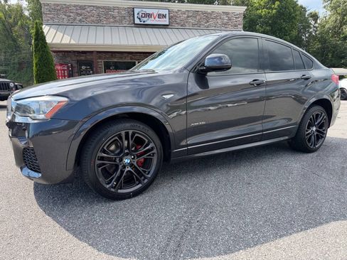 Used 2015 BMW X4 xDrive35i AWD/4WD image 1