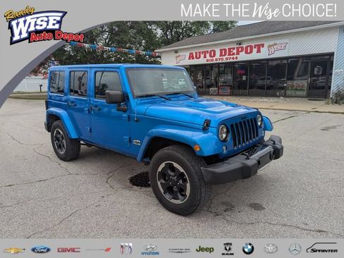 Used 2014 Jeep Wrangler Unlimited Sahara AWD/4WD image 1