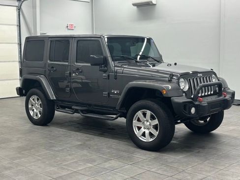Used 2016 Jeep Wrangler Unlimited Sahara w/ Max Tow Package image 1