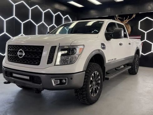 Used 2019 Nissan Titan PRO-4X w/ Pro-4x Utility Package AWD/4WD image 1