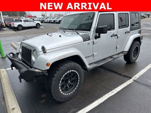 Used 2010 Jeep Wrangler Unlimited Sahara w/ Dual Top Group image 1