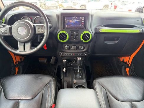 Used 2013 Jeep Wrangler Unlimited Rubicon w/ Dual Top Group AWD/4WD image 9