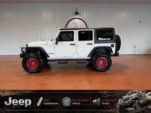 Used 2013 Jeep Wrangler Unlimited Sport AWD/4WD image 1