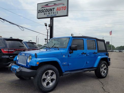 Used 2016 Jeep Wrangler Unlimited Sahara AWD/4WD image 1