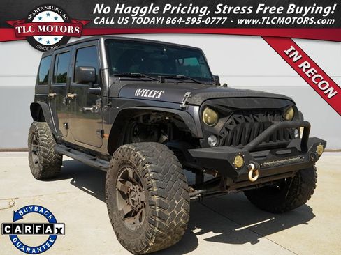 Used 2014 Jeep Wrangler Unlimited Sport AWD/4WD image 1