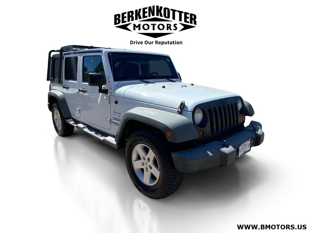 Used 2012 Jeep Wrangler Unlimited Sport AWD/4WD image 1