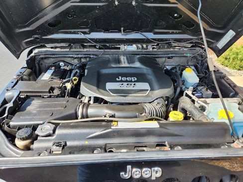 Used 2012 Jeep Wrangler Unlimited Sport AWD/4WD image 14