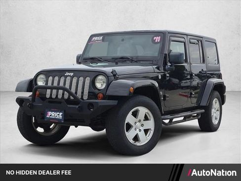 Used 2011 Jeep Wrangler Unlimited Sahara w/ Dual Top Group AWD/4WD image 1