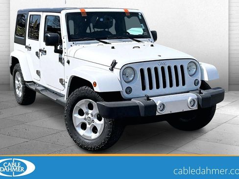 Used 2014 Jeep Wrangler Unlimited Sahara w/ Dual Top Group image 1