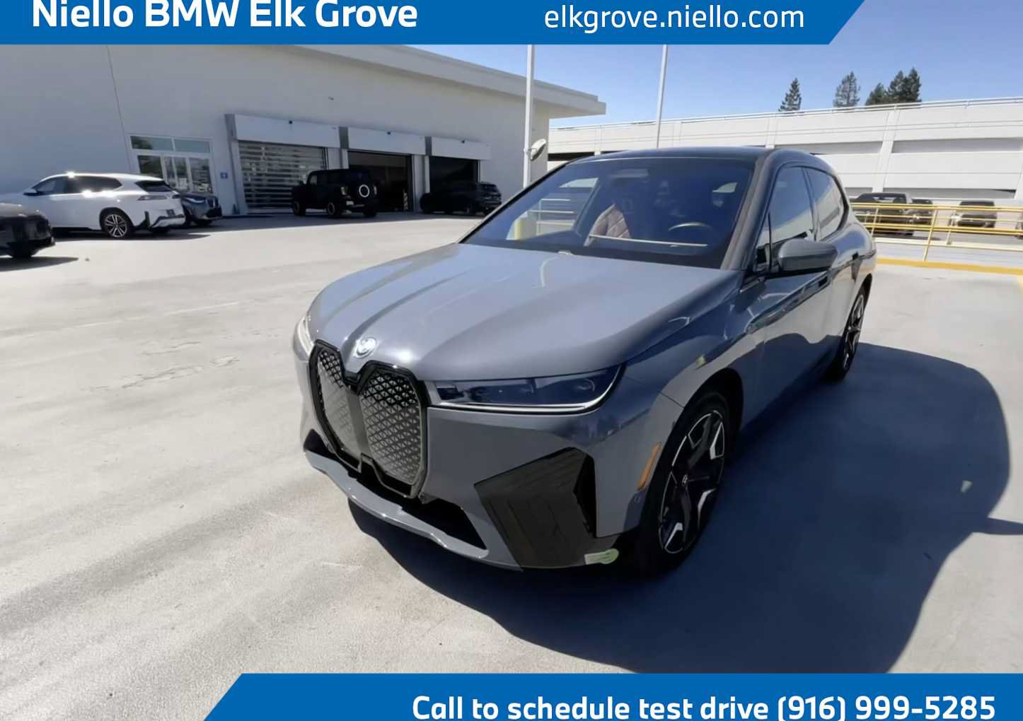 Used 2024 BMW iX xDrive50 w/ Premium Package AWD/4WD image 1