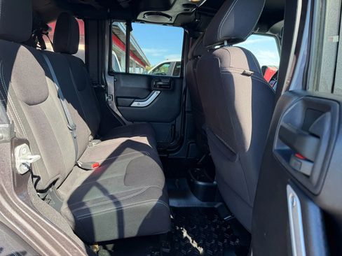 Used 2014 Jeep Wrangler Unlimited Sahara w/ Dual Top Group image 12