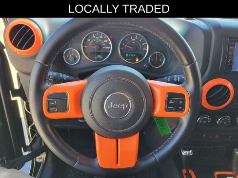 Used 2012 Jeep Wrangler Unlimited Sahara w/ Dual Top Group AWD/4WD image 18
