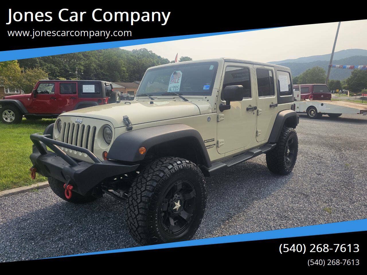 Used 2012 Jeep Wrangler Unlimited Sport AWD/4WD image 1