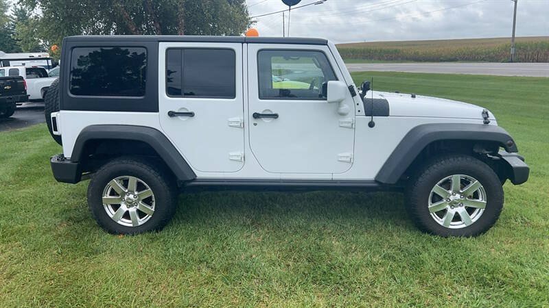 Used 2013 Jeep Wrangler Unlimited Sport AWD/4WD image 1
