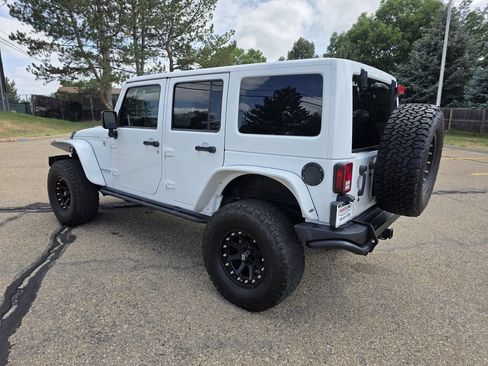 Used 2013 Jeep Wrangler Unlimited Sahara w/ Dual Top Group AWD/4WD image 3