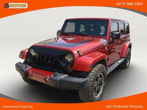 Used 2012 Jeep Wrangler Unlimited Sahara AWD/4WD image 1