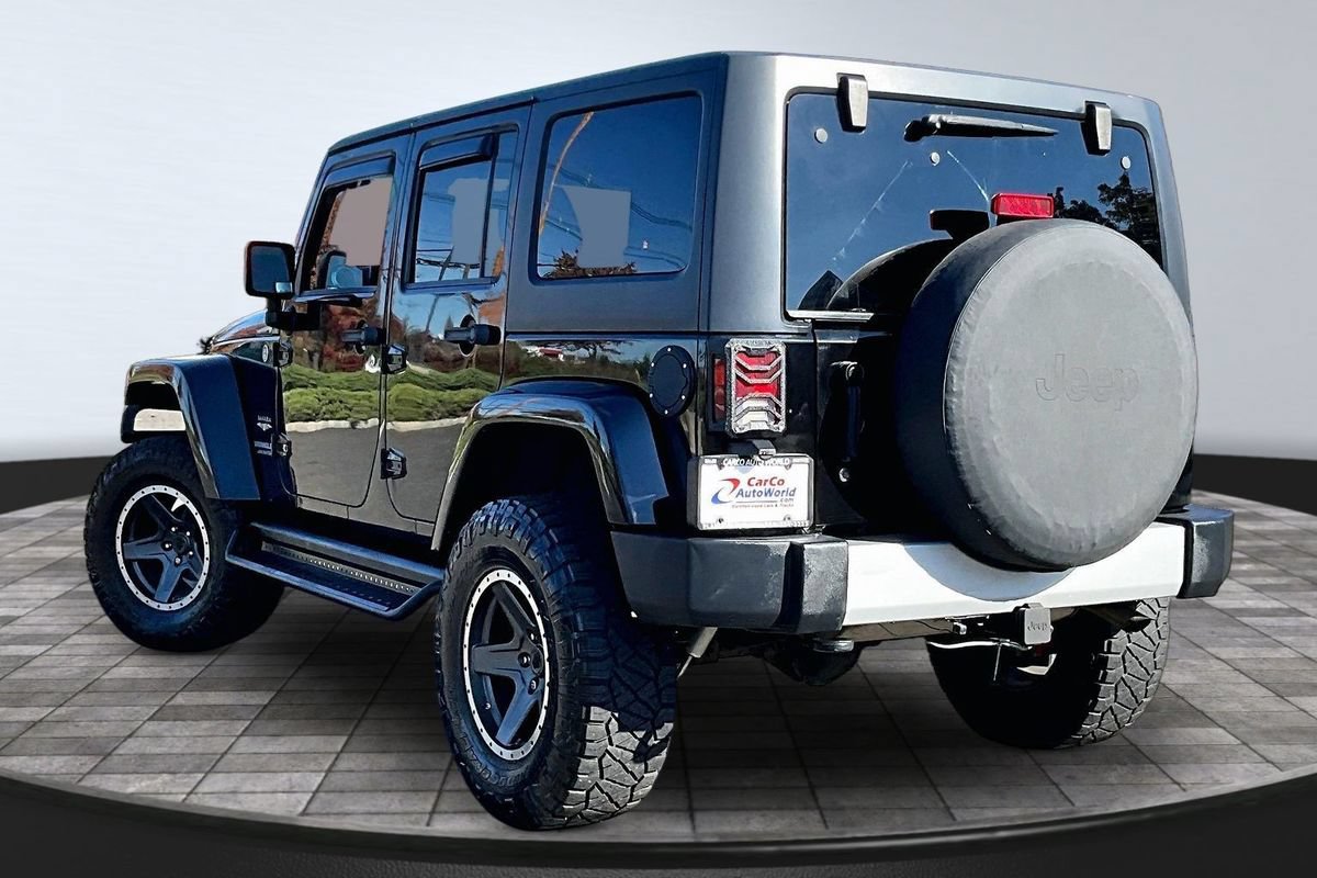 Used 2012 Jeep Wrangler Unlimited Sahara w/ Dual Top Group AWD/4WD image 7