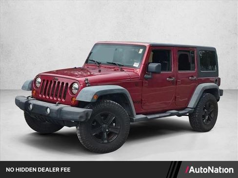 Used 2013 Jeep Wrangler Unlimited Sport AWD/4WD image 1