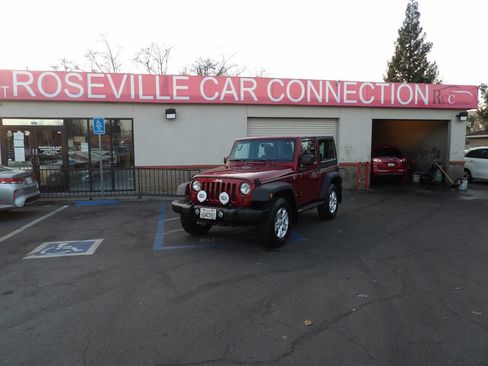 Used 2012 Jeep Wrangler Sport w/ Black Appearance Group image 1