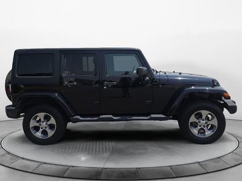 Used 2016 Jeep Wrangler Unlimited Sahara w/ Dual Top Group AWD/4WD image 6