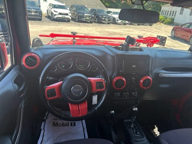 Used 2014 Jeep Wrangler Unlimited Sahara w/ Mopar Chrome Edition Group AWD/4WD image 16