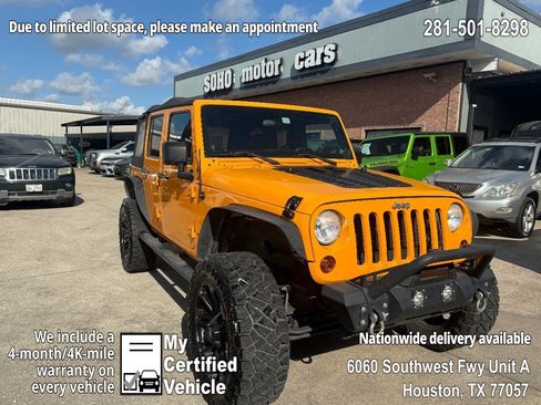 Used 2012 Jeep Wrangler Unlimited Sport image 1
