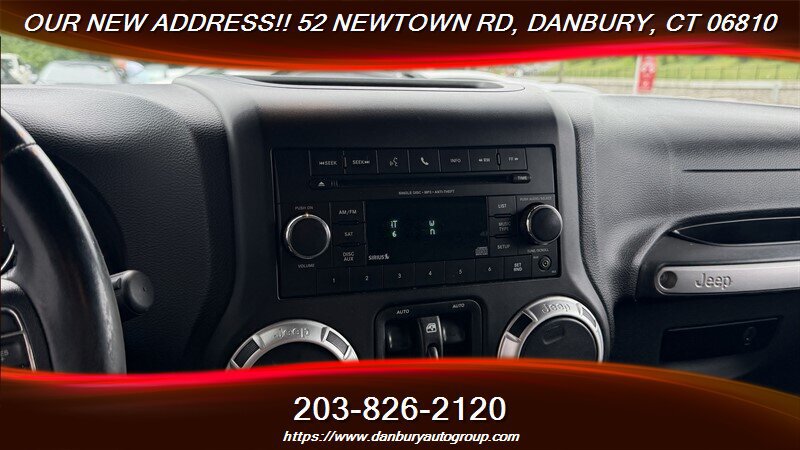 Used 2014 Jeep Wrangler Unlimited Sahara w/ Dual Top Group AWD/4WD image 15